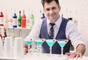Bartender with drinks