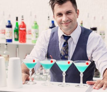 Bartender with drinks